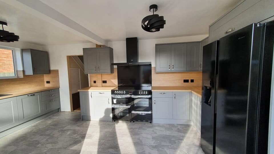 Completed Chelford Slate Grey kitchen after the doorway and chimney breast alterations