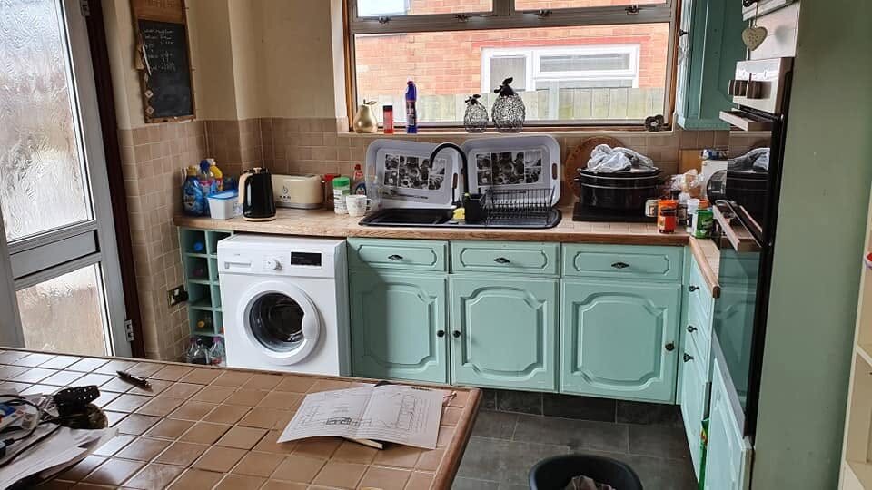 Original green kitchen before its Chelford Slate Grey transformation, sink area