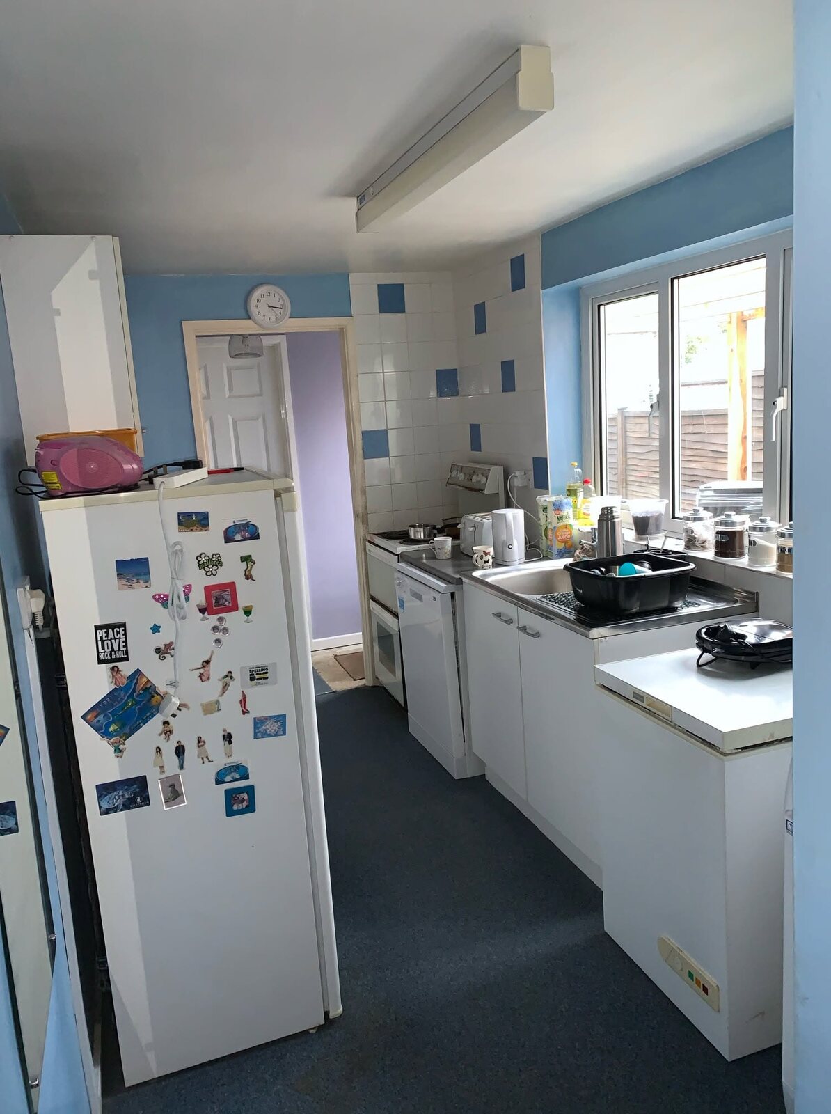 Original blue and white kitchen before the complete renovation