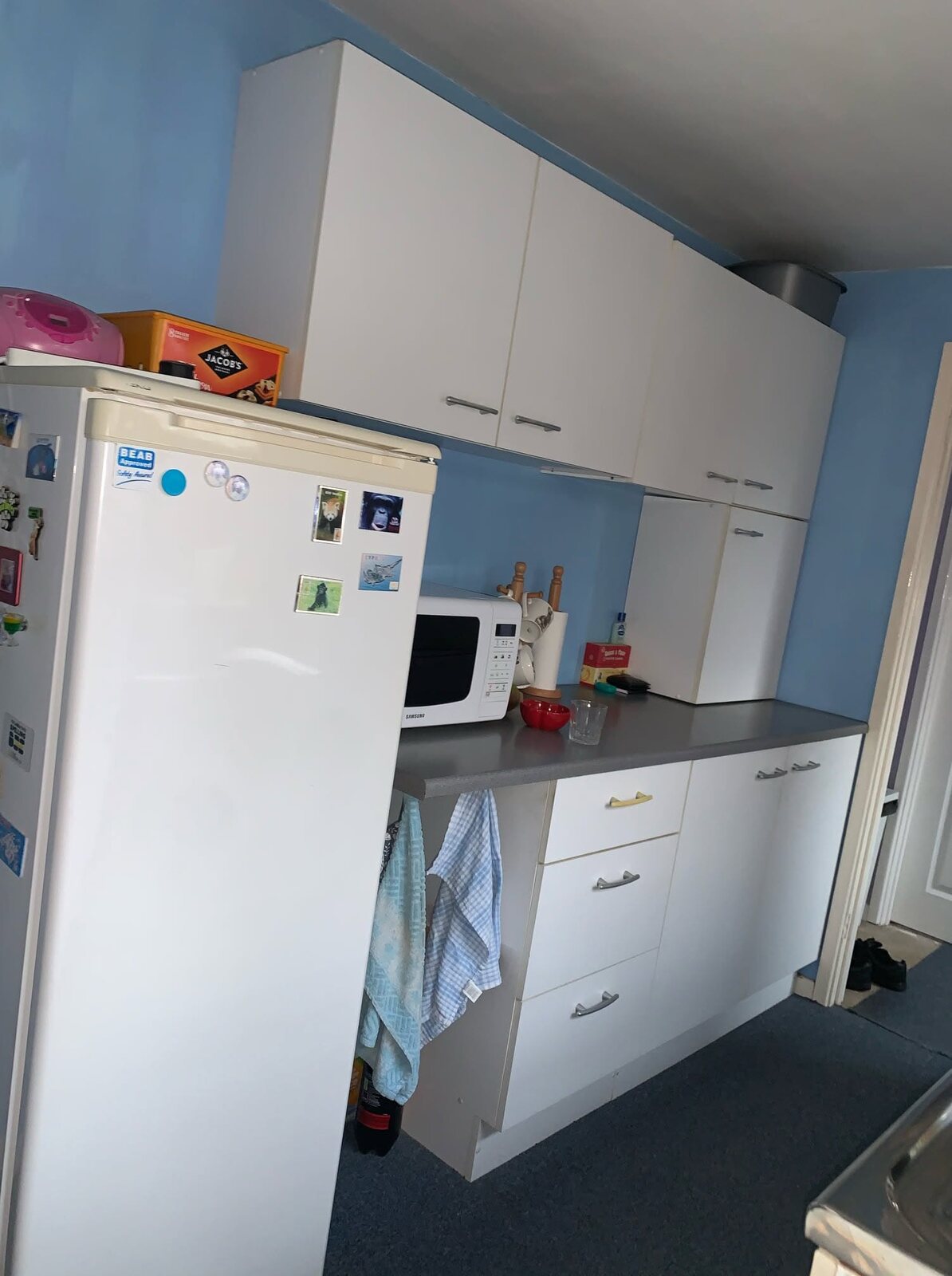 Original storage side of the kitchen before renovation