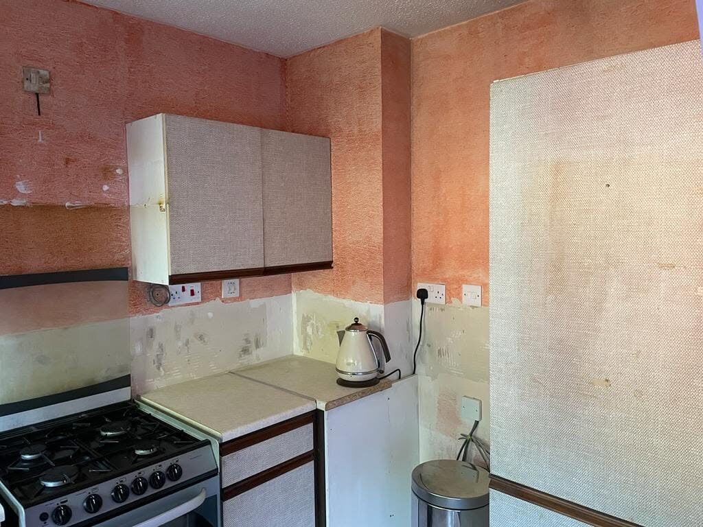 Small kitchen before its complete Witney Dove Grey renovation, cooking side